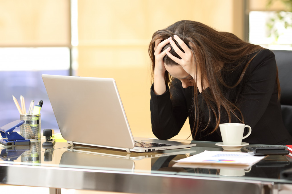 woman stressing out from work